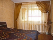 Лёгкие шторы для спальни в квартире в Тольятти.